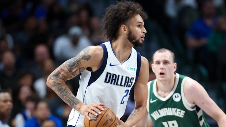 Oct 17, 2024; Dallas, Texas, USA;  Dallas Mavericks center Dereck Lively II (2) looks to pass as Milwaukee Bucks center Anzejs Pasecniks (18) defends during the second half at American Airlines Center. Mandatory Credit: Kevin Jairaj-Imagn Images