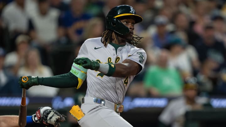 May 10, 2024; Seattle, Washington, USA; Oakland Athletics right fielder Lawrence Butler (4) takes a swing during an at-bat against the Seattle Mariners at T-Mobile Park. Mandatory Credit: Stephen Brashear-USA TODAY Sports May 10, 2024; Seattle, Washington, USA; Oakland Athletics right fielder Lawrence Butler (4) takes a swing during an at-bat against the Seattle Mariners at T-Mobile Park. Mandatory Credit: Stephen Brashear-USA TODAY Sports