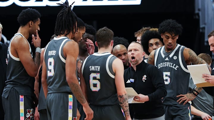 Louisville basketball coach Pat Kelsey instructs his team during a timeout against Wake Forest in their game at the KFC Yum! Center in Louisville, Ky. on Jan. 28, 2025