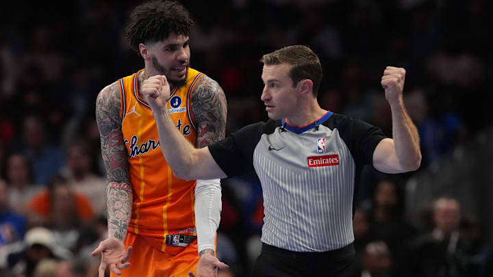 Mar 26, 2026; Charlotte, North Carolina, USA; Charlotte Hornets guard LaMelo Ball (1) argues a call with referee Brandon Schwab (86) during the second half against the New York Knicks at the Spectrum Center. Mandatory Credit: Jim Dedmon-Imagn Images Mar 26, 2026; Charlotte, North Carolina, USA; Charlotte Hornets guard LaMelo Ball (1) argues a call with referee Brandon Schwab (86) during the second half against the New York Knicks at the Spectrum Center. Mandatory Credit: Jim Dedmon-Imagn Images