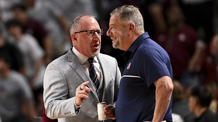 Texas A&M Aggies head coach Buzz Williams, left, speaks with Auburn Tigers head coach Bruce Pearl, right, prior to the game at Reed Arena. Texas A&M Aggies head coach Buzz Williams, left, speaks with Auburn Tigers head coach Bruce Pearl, right, prior to the game at Reed Arena.