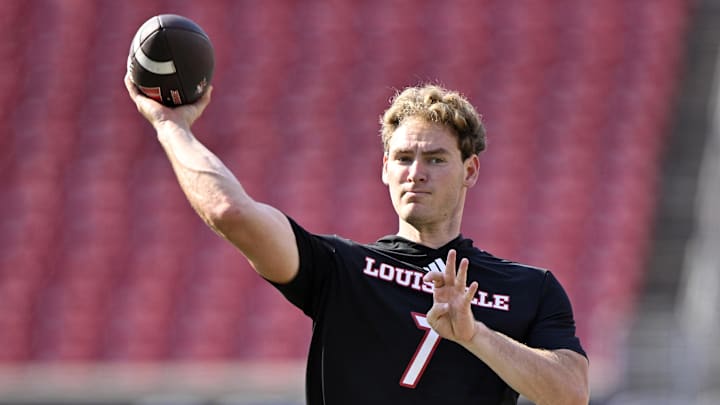 Sep 20, 2025; Louisville, Kentucky, USA;  Louisville Cardinals quarterback Miller Moss (7) warms up before facing off against the Bowling Green Falcons at L&N Federal Credit Union Stadium. Mandatory Credit: Jamie Rhodes-Imagn Images