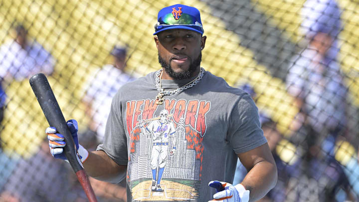 Oct 14, 2024; Los Angeles, California, USA; New York Mets outfielder Starling Marte (6) warms up before game two against the Los Angeles Dodgers in the NLCS for the 2024 MLB Playoffs at Dodger Stadium. Mandatory Credit: Jayne Kamin-Oncea-Imagn Images