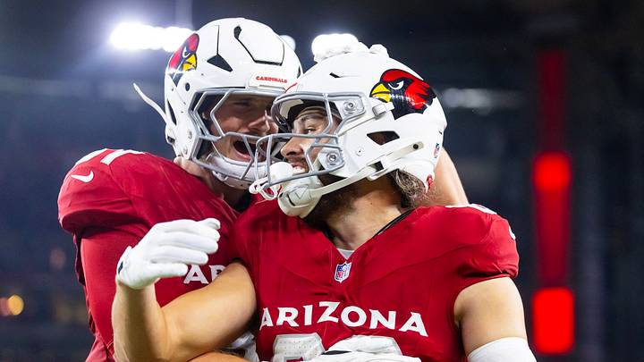 Aug 23, 2025; Glendale, Arizona, USA; Arizona Cardinals wide receiver Simi Fehoko (80) celebrates a touchdown with teammate Travis Vokolek (81) against the Las Vegas Raiders during a preseason NFL game at State Farm Stadium. Mandatory Credit: Mark J. Rebilas-Imagn Images Aug 23, 2025; Glendale, Arizona, USA; Arizona Cardinals wide receiver Simi Fehoko (80) celebrates a touchdown with teammate Travis Vokolek (81) against the Las Vegas Raiders during a preseason NFL game at State Farm Stadium. Mandatory Credit: Mark J. Rebilas-Imagn Images