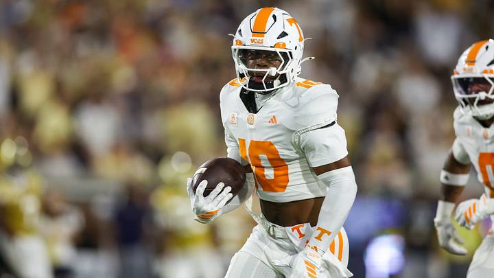 Sep 12, 2026; Atlanta, Georgia, USA; Tennessee Volunteers defensive back Dejuan Lane (10) returns an interception for a touchdown against the Georgia Tech Yellow Jackets in the second quarter at Bobby Dodd Stadium at Hyundai Field. Mandatory Credit: Brett Davis-Imagn Images Sep 12, 2026; Atlanta, Georgia, USA; Tennessee Volunteers defensive back Dejuan Lane (10) returns an interception for a touchdown against the Georgia Tech Yellow Jackets in the second quarter at Bobby Dodd Stadium at Hyundai Field. Mandatory Credit: Brett Davis-Imagn Images