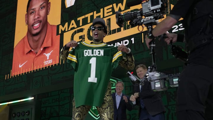 Receiver Matthew Golden of Texas poses after being selected by the Green Bay Packers in the first round of the NFL Draft.