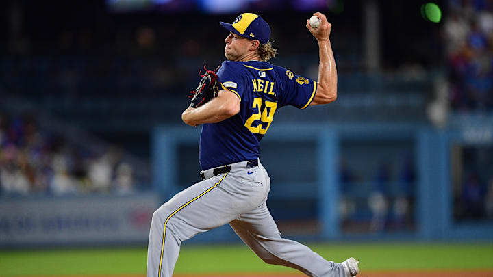 Jul 18, 2025; Los Angeles, California, USA; Milwaukee Brewers pitcher Trevor Megill (29) throws against the ;Los Angeles Dodgers during the ninth inning at Dodger Stadium. Mandatory Credit: Gary A. Vasquez-Imagn Images Jul 18, 2025; Los Angeles, California, USA; Milwaukee Brewers pitcher Trevor Megill (29) throws against the ;Los Angeles Dodgers during the ninth inning at Dodger Stadium. Mandatory Credit: Gary A. Vasquez-Imagn Images