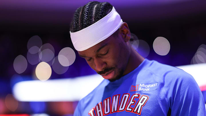 Mar 23, 2026; Philadelphia, Pennsylvania, USA; Oklahoma City Thunder guard Shai Gilgeous-Alexander during the anthem before action against the Philadelphia 76ers at Xfinity Mobile Arena. Mandatory Credit: Bill Streicher-Imagn Images