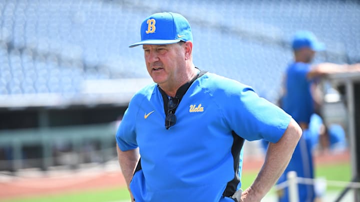 Jun 14, 2025; Omaha, Neb, USA; UCLA Bruins head coach John Savage on the field before the game against the Murray State Races at Charles Schwab Field. Mandatory Credit: Steven Branscombe-Imagn Images Jun 14, 2025; Omaha, Neb, USA; UCLA Bruins head coach John Savage on the field before the game against the Murray State Races at Charles Schwab Field. Mandatory Credit: Steven Branscombe-Imagn Images
