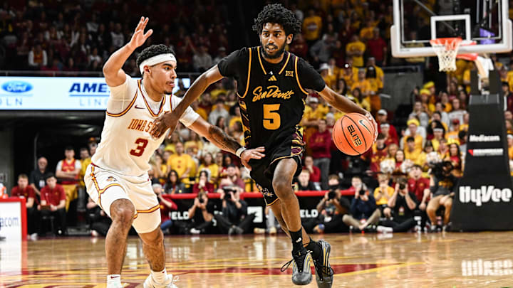 Mar 7, 2026; Ames, Iowa, USA; Arizona State Sun Devils guard Maurice Odum (5) is defended by Iowa State Cyclones guard Tamin Lipsey (3) during the second half at James H. Hilton Coliseum. Mandatory Credit: Jeffrey Becker-Imagn Images Mar 7, 2026; Ames, Iowa, USA; Arizona State Sun Devils guard Maurice Odum (5) is defended by Iowa State Cyclones guard Tamin Lipsey (3) during the second half at James H. Hilton Coliseum. Mandatory Credit: Jeffrey Becker-Imagn Images