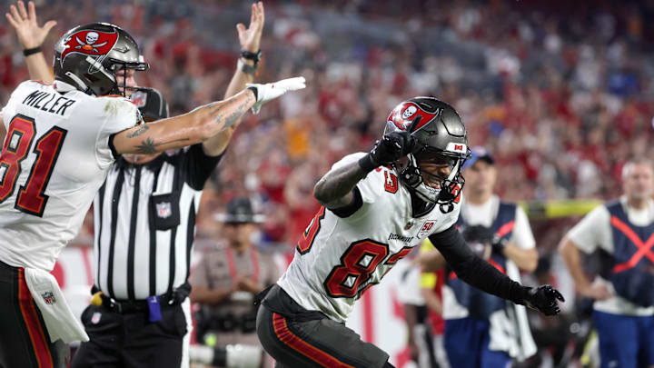 Aug 23, 2025; Tampa, Florida, USA;Tampa Bay Buccaneers wide receiver Tez Johnson (83) celebrates after scoring a touchdown against the Buffalo Bills during the second quarter at Raymond James Stadium. Mandatory Credit: Kim Klement Neitzel-Imagn Images