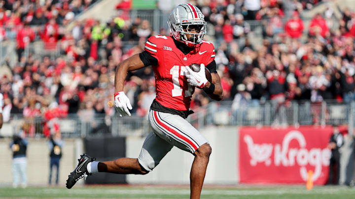 Nov 1, 2025; Columbus, Ohio, USA; Ohio State Buckeyes wide receiver Carnell Tate (17) catches a long pass during the third quarter against the Penn State Nittany Lions at Ohio Stadium. Mandatory Credit: Joseph Maiorana-Imagn Images Nov 1, 2025; Columbus, Ohio, USA; Ohio State Buckeyes wide receiver Carnell Tate (17) catches a long pass during the third quarter against the Penn State Nittany Lions at Ohio Stadium. Mandatory Credit: Joseph Maiorana-Imagn Images