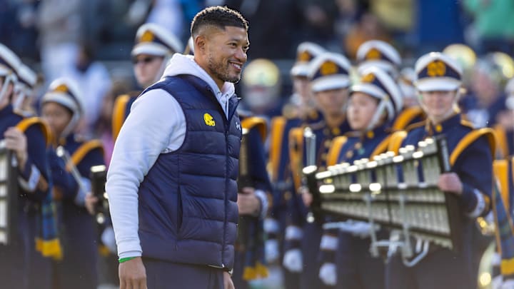 Nov 22, 2025; South Bend, Indiana, USA; Notre Dame Fighting Irish head coach Marcus Freeman smiles while participating in senior day activities before facing the Syracuse Orange at Notre Dame Stadium. Mandatory Credit: Michael Caterina-Imagn Images