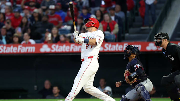 Apr 4, 2025; Anaheim, California, USA;  Los Angeles Angels right fielder Mike Trout (27) hits a home run during the first inning against the Cleveland Guardians at Angel Stadium. Mandatory Credit: Kiyoshi Mio-Imagn Images
