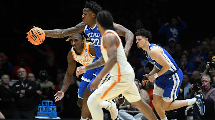 Mar 28, 2025; Indianapolis, IN, USA; Kentucky Wildcats center Amari Williams (22) dribbles the ball against the Tennessee Volunteers in the second half during a Midwest Regional semifinal of the 2025 NCAA tournament at Lucas Oil Stadium. Mandatory Credit: Robert Goddin-Imagn Images