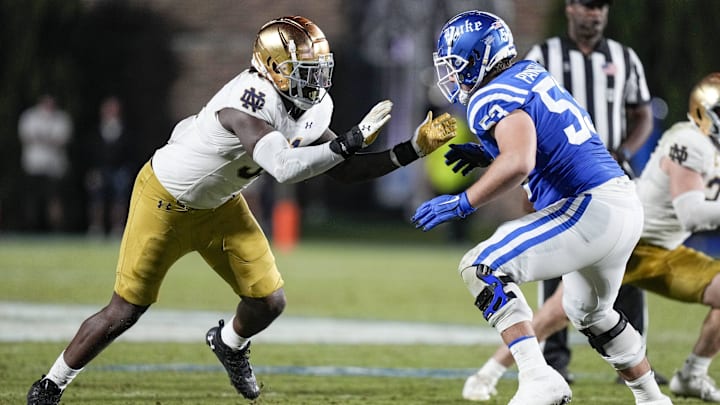 Sep 30, 2023; Durham, North Carolina, USA; Notre Dame Fighting Irish defensive lineman Nana Osafo-Mensah (31) against Duke Blue Devils offensive lineman Brian Parker II (53) during the second half at Wallace Wade Stadium. Mandatory Credit: Jim Dedmon-Imagn Images Sep 30, 2023; Durham, North Carolina, USA; Notre Dame Fighting Irish defensive lineman Nana Osafo-Mensah (31) against Duke Blue Devils offensive lineman Brian Parker II (53) during the second half at Wallace Wade Stadium. Mandatory Credit: Jim Dedmon-Imagn Images