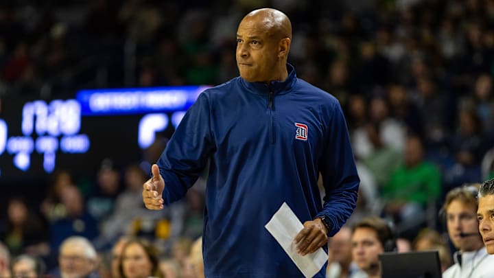 Nov 7, 2025; South Bend, Indiana, USA; Detroit Mercy Titans head coach Mark Montgomery waits to give a high five against the Notre Dame Fighting Irish during the first half at Purcell Pavilion at the Joyce Center. Mandatory Credit: Michael Caterina-Imagn Images