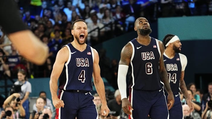 Aug 10, 2024; Paris, France; United States guard Stephen Curry (4) and forward LeBron James (6) against France in the men's basketball gold medal game during the Paris 2024 Olympic Summer Games at Accor Arena. 