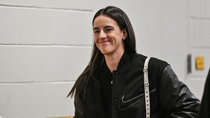 Feb 2, 2025; Iowa City, Iowa, USA; Former Iowa Hawkeyes player Caitlin Clark enters Carver-Hawkeye Arena before the game against the USC Trojans. The Hawkeyes will be retiring the jersey of Clark after the game. Mandatory Credit: Jeffrey Becker-Imagn Images