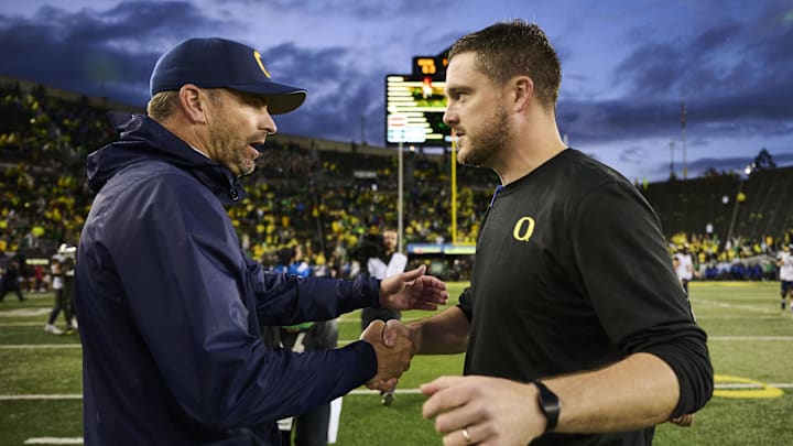 Cal head coach Justin Wilcox (left) and Oregon head coach Dan Lanning in 2023