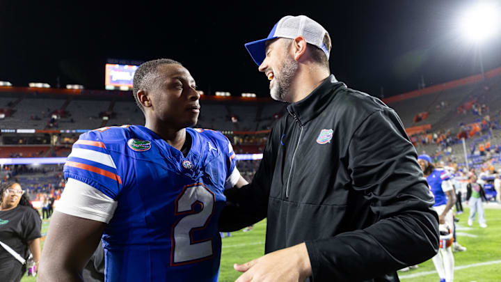 Oct 19, 2024; Gainesville, Florida, USA; Florida Gators quarterback DJ Lagway (2) and Florida Gators offensive analyst for quarterbacks Ryan O'Hara embrace after a game against the Kentucky Wildcats at Ben Hill Griffin Stadium. Mandatory Credit: Matt Pendleton-Imagn Images Oct 19, 2024; Gainesville, Florida, USA; Florida Gators quarterback DJ Lagway (2) and Florida Gators offensive analyst for quarterbacks Ryan O'Hara embrace after a game against the Kentucky Wildcats at Ben Hill Griffin Stadium. Mandatory Credit: Matt Pendleton-Imagn Images