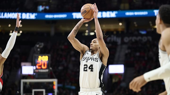 San Antonio Spurs guard Devin Vassell (24) shoots a jump shot.