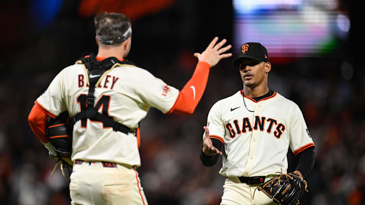 Jun 4, 2025; San Francisco, California, USA; San Francisco Giants pitcher Randy Rodriguez (73) and catcher Patrick Bailey (14) celebrate their win over the San Diego Padres at Oracle Park. Mandatory Credit: Eakin Howard-Imagn Images