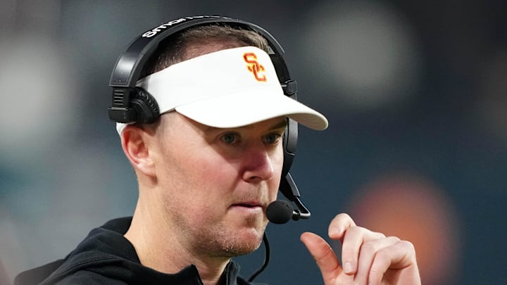 Dec 27, 2024; Las Vegas, NV, USA; Southern California Trojans head coach Lincoln Riley reacts against the Texas A&M Aggies in the second half at Allegiant Stadium. Mandatory Credit: Kirby Lee-Imagn Images Dec 27, 2024; Las Vegas, NV, USA; Southern California Trojans head coach Lincoln Riley reacts against the Texas A&M Aggies in the second half at Allegiant Stadium. Mandatory Credit: Kirby Lee-Imagn Images