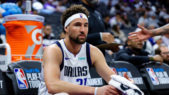 Apr 16, 2025; Sacramento, California, USA; Dallas Mavericks guard Klay Thompson (31) sits on the bench during the fourth quarter against the Sacramento Kings at Golden 1 Center. Mandatory Credit: Sergio Estrada-Imagn Images
