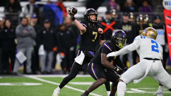 Nov 15, 2024; Seattle, Washington, USA; Washington Huskies quarterback Will Rogers (7) passes the ball against the UCLA Bruins during the first half at Alaska Airlines Field at Husky Stadium. Mandatory Credit: Steven Bisig-Imagn Images