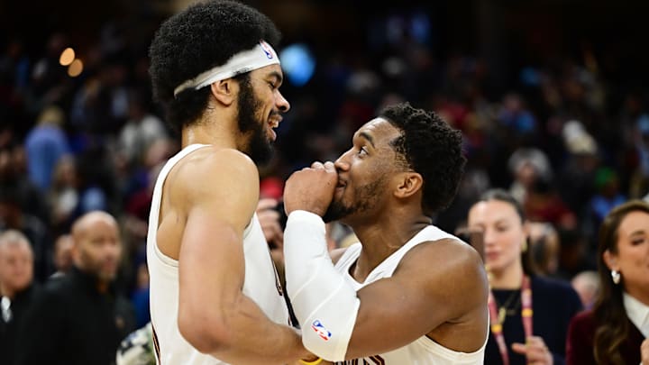 Jan 8, 2025; Cleveland, Ohio, USA; Cleveland Cavaliers guard Donovan Mitchell (45) celebrates with center Jarrett Allen (31) after the Cavaliers beat the Oklahoma City Thunder at Rocket Mortgage FieldHouse. Mandatory Credit: Ken Blaze-Imagn Images