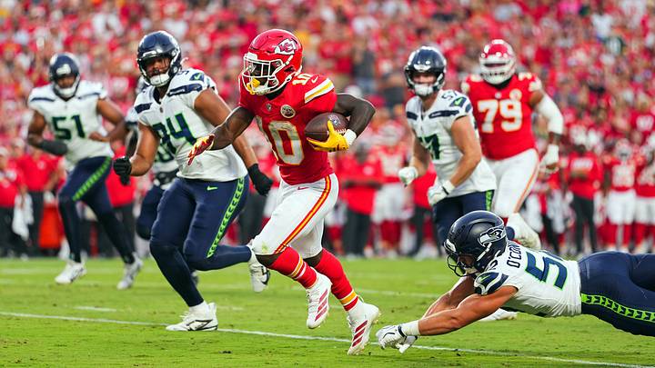 Aug 28, 2026; Kansas City, Missouri, USA; Kansas City Chiefs running back Emmett Johnson (10) runs the ball against Seattle Seahawks linebacker Patrick O'Connell (52) during the first half at Arrowhead Stadium. Mandatory Credit: Jay Biggerstaff-Imagn Images Aug 28, 2026; Kansas City, Missouri, USA; Kansas City Chiefs running back Emmett Johnson (10) runs the ball against Seattle Seahawks linebacker Patrick O'Connell (52) during the first half at Arrowhead Stadium. Mandatory Credit: Jay Biggerstaff-Imagn Images