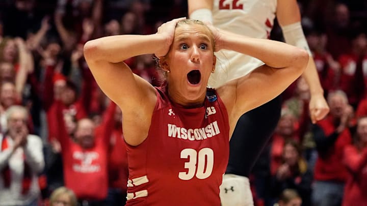 Wisconsin libero/defensive specialist Lola Schumacher (30) and libero Julia Orzol (22) react to scoring during the third set against Georgia Tech in the second-round match of the NCAA volleyball playoffs on Friday December 6, 2024 at the UW Field House in Madison, Wis.