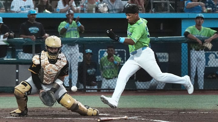 Daytona's Carlos Sanchez (33) scores a run as Bradenton's catcher waits for the throw, Friday, April 4, 2025 at Jackie Robinson Ballpark in Daytona Beach.