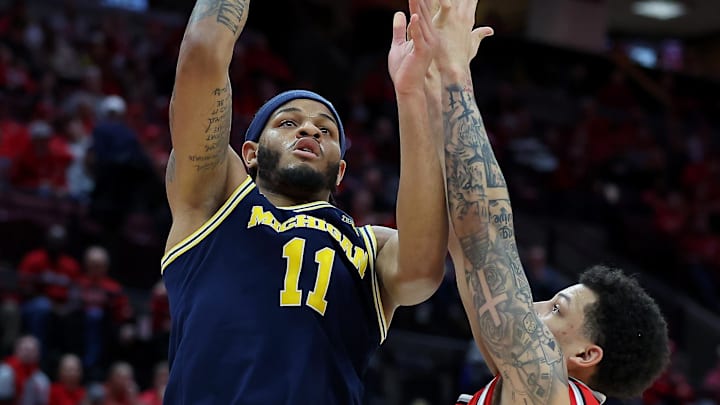 Feb 16, 2025; Columbus, Ohio, USA;  Michigan Wolverines guard Roddy Gayle Jr. (11) shoots the ball over Ohio State Buckeyes guard John Mobley Jr. (0) during the first half at Value City Arena. Mandatory Credit: Joseph Maiorana-Imagn Images