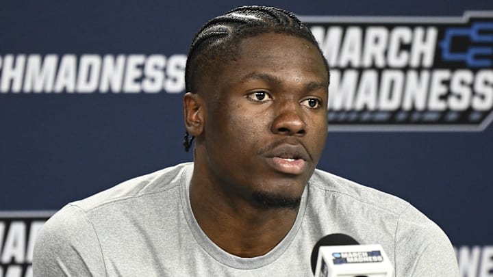 Mar 19, 2026; San Diego, CA, USA; Kansas Jayhawks forward Flory Bidunga (40) speaks at a news conference ahead of the first round of the men's 2026 NCAA Tournament at Viejas Arena. Mandatory Credit: Denis Poroy-Imagn Images