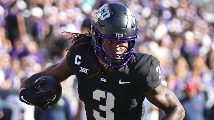 Nov 23, 2024; Fort Worth, Texas, USA; TCU Horned Frogs wide receiver Savion Williams (3) runs the ball against the Arizona Wildcats in the first quarter at Amon G. Carter Stadium.  