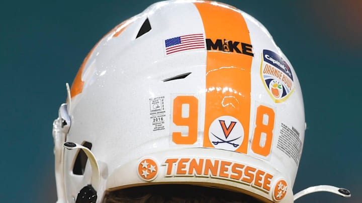 Stickers are seen on Tennessee punter Jackson Ross    (98) helmet before the Orange Bowl game between the Tennessee Vols and Clemson Tigers at Hard Rock Stadium in Miami Gardens, Fla. on Friday, Dec. 30, 2022.

Orangebowl1230 0338