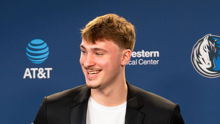 Apr 29, 2026; Dallas, TX, USA;  Dallas Maverick Cooper Flagg holds the  2025-26 NBA Rookie of the Year trophy during a press conference at American Airlines Center. Mandatory Credit: Raymond Carlin III-Imagn Images
