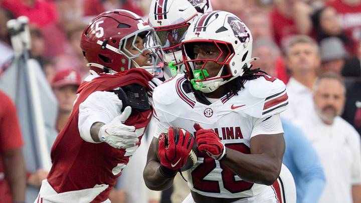 Sep 26, 2026; Tuscaloosa, AL, USA; South Carolina running back Matt Fuller (28) gets around a reach by Alabama Dijon Lee Jr. (5) who is being blocked as Fuller makes a long run at Saban Field at Bryant Denny Stadium. Mandatory Credit: Gary Cosby Jr.-Tuscaloosa News Sep 26, 2026; Tuscaloosa, AL, USA; South Carolina running back Matt Fuller (28) gets around a reach by Alabama Dijon Lee Jr. (5) who is being blocked as Fuller makes a long run at Saban Field at Bryant Denny Stadium. Mandatory Credit: Gary Cosby Jr.-Tuscaloosa News