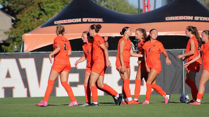 The Oregon State Women's Soccer team shaking hands and celebrating after a goal. The Oregon State Women's Soccer team shaking hands and celebrating after a goal.