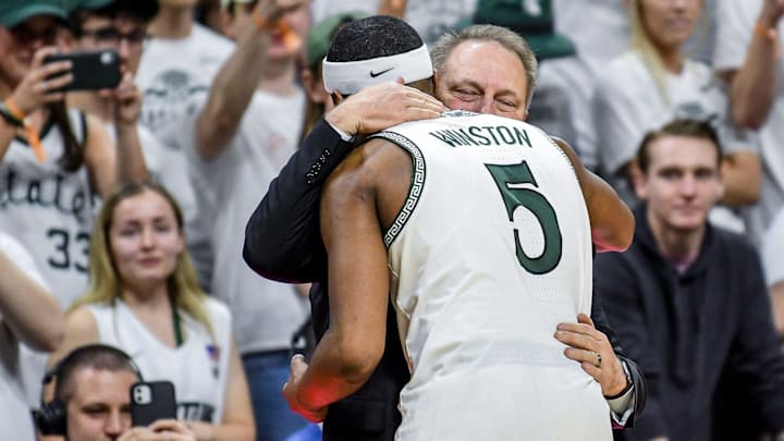 Michigan State's Cassius Winston, left, hugs head coach Tom Izzo after checking out of the game during the second half on Sunday, March 8, 2020, at the Breslin Center in East Lansing.

200308 Msu Osu 246a