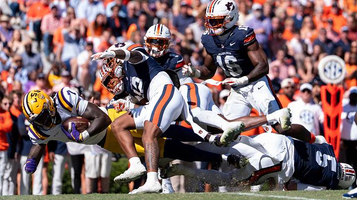 LSU Tigers tight end Trey'Dez Green (7) dives in the end zone for a touchdown after a catch as Auburn Tigers take on LSU Tigers at Jordan-Hare Stadium in Auburn, Ala. on Saturday, Oct. 24, 2026. LSU Tigers lead Auburn Tigers 31-10 at halftime. LSU Tigers tight end Trey'Dez Green (7) dives in the end zone for a touchdown after a catch as Auburn Tigers take on LSU Tigers at Jordan-Hare Stadium in Auburn, Ala. on Saturday, Oct. 24, 2026. LSU Tigers lead Auburn Tigers 31-10 at halftime.