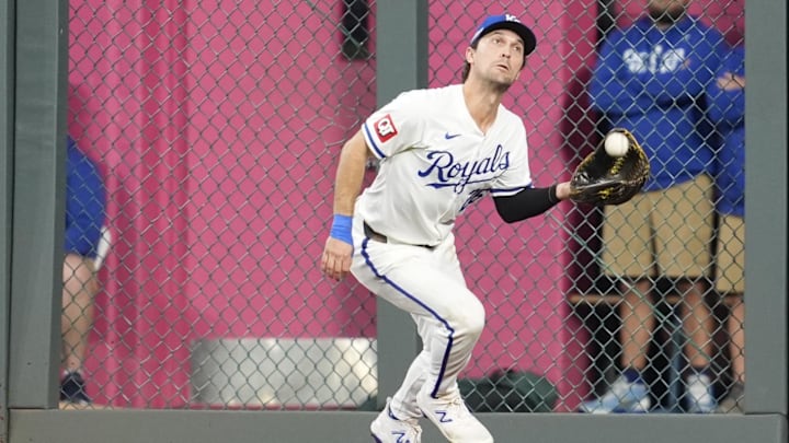 Oct 9, 2024; Kansas City, Missouri, USA; Kansas City Royals second base Adam Frazier (26) makes catch in the third inning against the New York Yankees during game three of the NLDS for the 2024 MLB Playoffs at Kauffman Stadium. Mandatory Credit: Jay Biggerstaff -Imagn Images Oct 9, 2024; Kansas City, Missouri, USA; Kansas City Royals second base Adam Frazier (26) makes catch in the third inning against the New York Yankees during game three of the NLDS for the 2024 MLB Playoffs at Kauffman Stadium. Mandatory Credit: Jay Biggerstaff -Imagn Images
