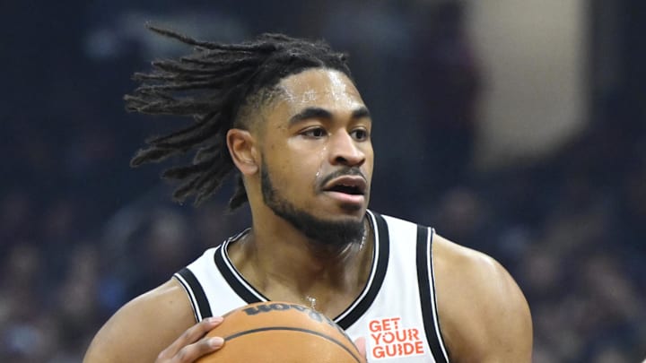 Mar 11, 2025; Cleveland, Ohio, USA; Brooklyn Nets guard Cam Thomas (24) dribbles beside Cleveland Cavaliers guard Sam Merrill (5) in the first quarter at Rocket Arena. Mandatory Credit: David Richard-Imagn Images Mar 11, 2025; Cleveland, Ohio, USA; Brooklyn Nets guard Cam Thomas (24) dribbles beside Cleveland Cavaliers guard Sam Merrill (5) in the first quarter at Rocket Arena. Mandatory Credit: David Richard-Imagn Images