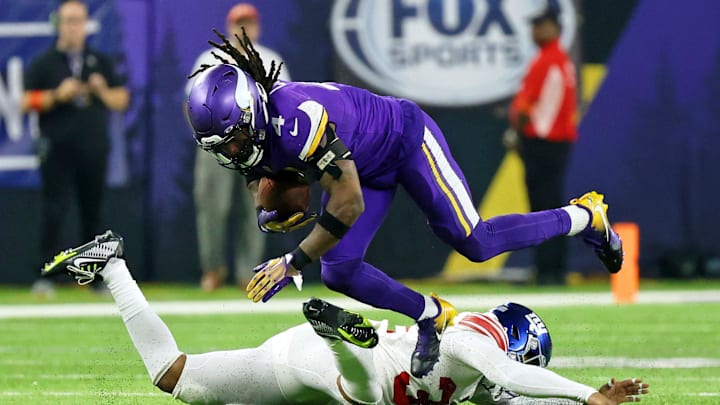 Jan 15, 2023; Minneapolis, Minnesota, USA; Minnesota Vikings running back Dalvin Cook (4) gets