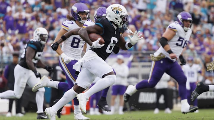 Nov 10, 2024; Jacksonville, Florida, USA; Jacksonville Jaguars safety Darnell Savage (6) makes an interception catch against the Minnesota Vikings during the third quarter at EverBank Stadium. Nov 10, 2024; Jacksonville, Florida, USA; Jacksonville Jaguars safety Darnell Savage (6) makes an interception catch against the Minnesota Vikings during the third quarter at EverBank Stadium.
