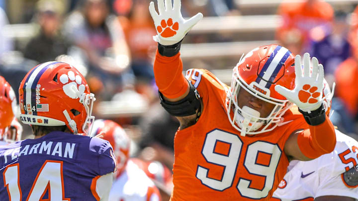 Clemson defensive end A.J. Hoffler (99) pressures Clemson quarterback Trent Pearman (14) during the