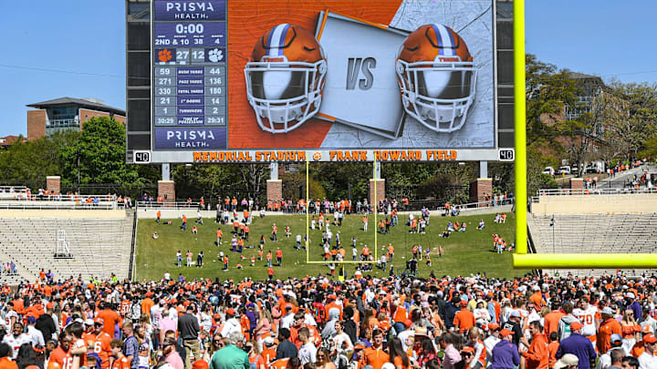 Clemson fans run on the field for meet me at the paw after the Spring football game in Clemson, S.C.