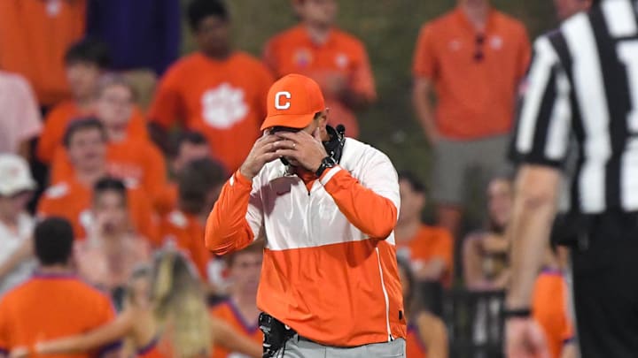 Nov 2, 2024; Clemson, South Carolina, USA; Clemson Tigers head coach Dabo Swinney reacts after people in the stands threw water bottles on the field after a call in favor of the Louisville Cardinals Cardinals during the fourth quarter at Memorial Stadium. Mandatory Credit: Ken Ruinard-Imagn Images